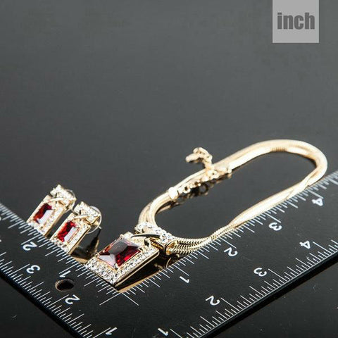 Image of Gold Color Unique Design with Dark Red Cubic Zirconia Earrings and Necklace Jewelry Sets