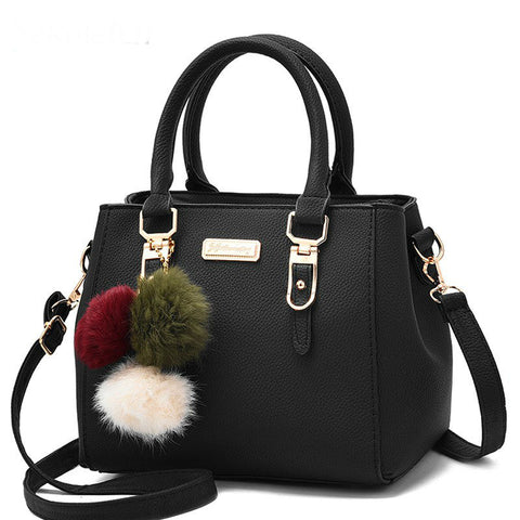 Image of Luxury Handbag with decorative fur
