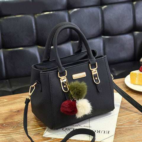 Image of Luxury Handbag with decorative fur