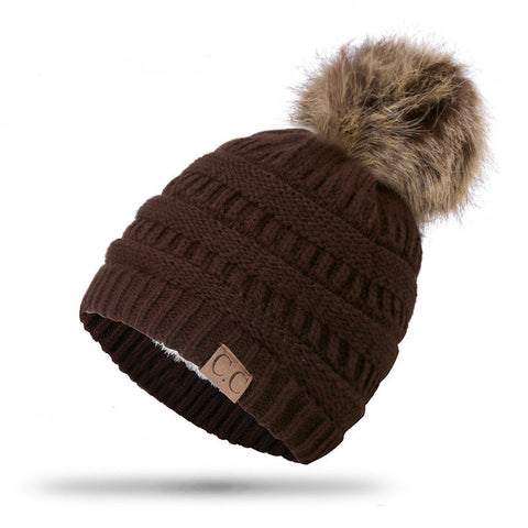 Image of Knitted Beanie with faux fur