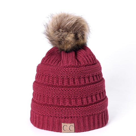 Image of Knitted Beanie with faux fur