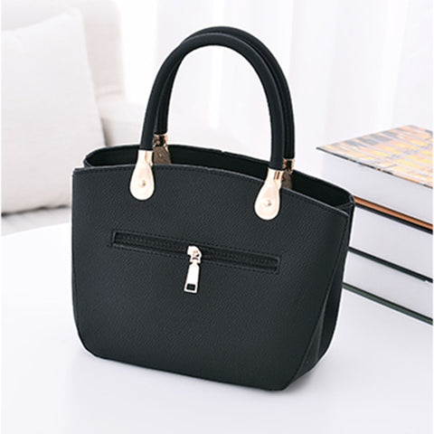 Image of Grommeted Leather Handbag with Grommets