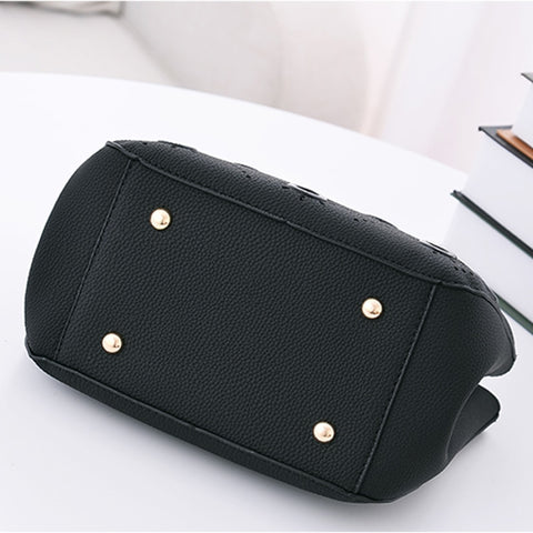 Image of Grommeted Leather Handbag with Grommets