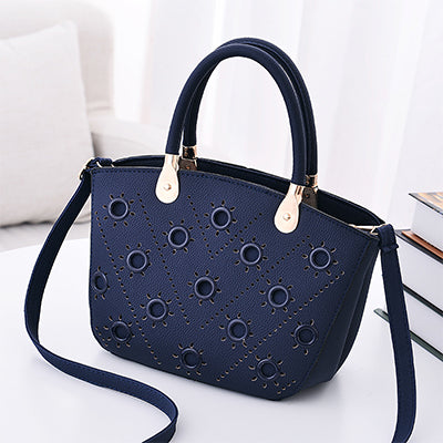 Image of Grommeted Leather Handbag with Grommets