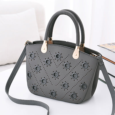 Image of Grommeted Leather Handbag with Grommets