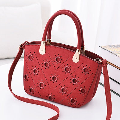 Image of Grommeted Leather Handbag with Grommets