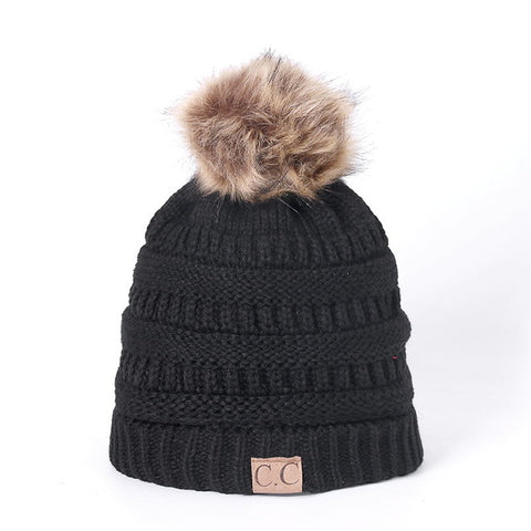 Image of Knitted Beanie with faux fur
