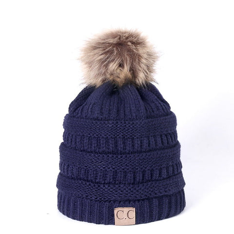 Image of Knitted Beanie with faux fur