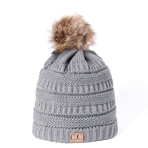 Image of Knitted Beanie with faux fur