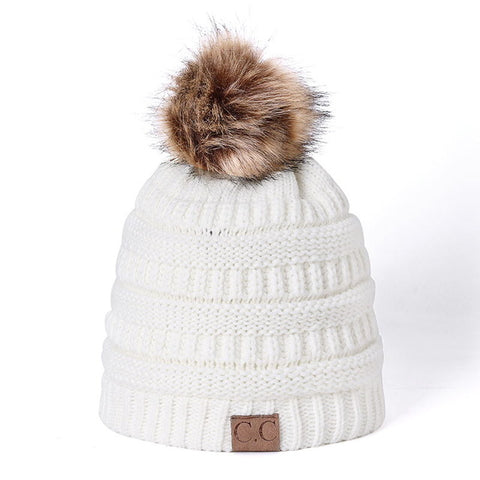Image of Knitted Beanie with faux fur