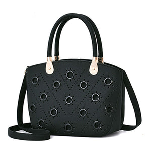 Grommeted Leather Handbag with Grommets