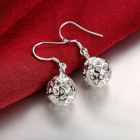 Image of Silver plated earrings with heart cut-outs