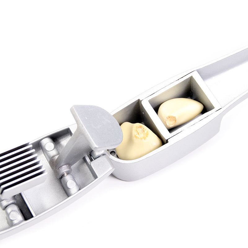 https://clutchenvy.com/cdn/shop/products/Garlic-Press-Slicer-2-in-1-Aluminium-Garlic-Ginger-Mincer-and-Slicer-with-Slicing-and-Grinding_e7366d24-c7ea-4d11-a113-eaeffa256ca0_1024x1024.jpg?v=1571312186