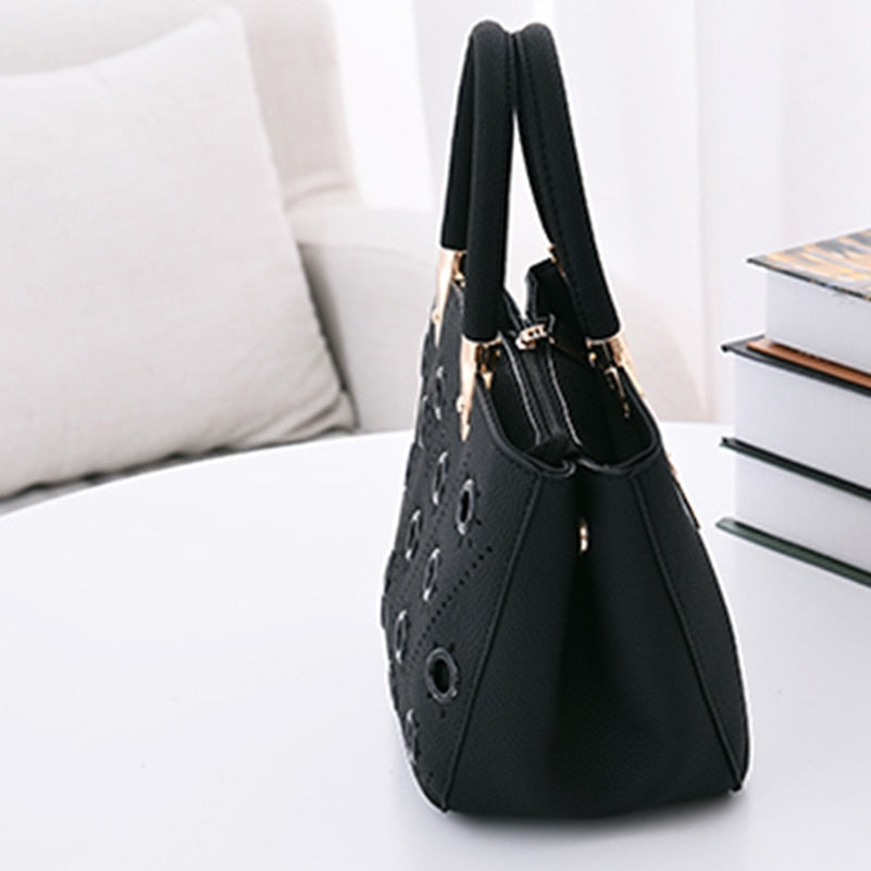 Grommeted Leather Handbag with Grommets