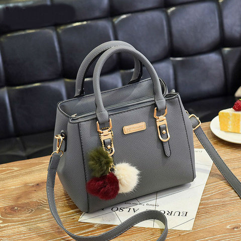 Image of Luxury Handbag with decorative fur