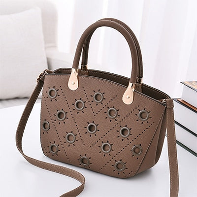 Image of Grommeted Leather Handbag with Grommets