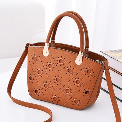 Grommeted Leather Handbag with Grommets